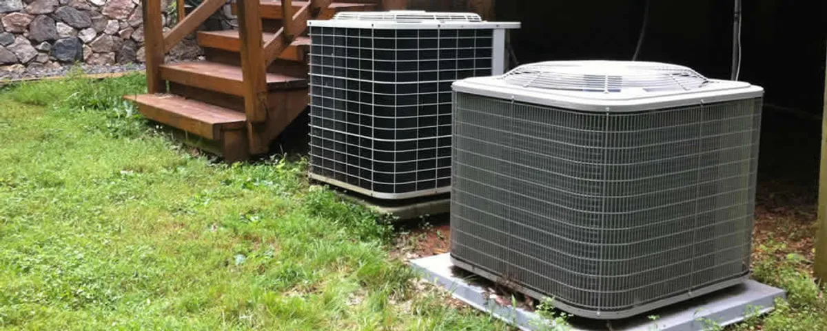 Heat pump installation and service units outside a home in Worcester, MA